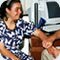 A photo of a woman having her pulse taken