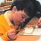 A photo of a boy at school